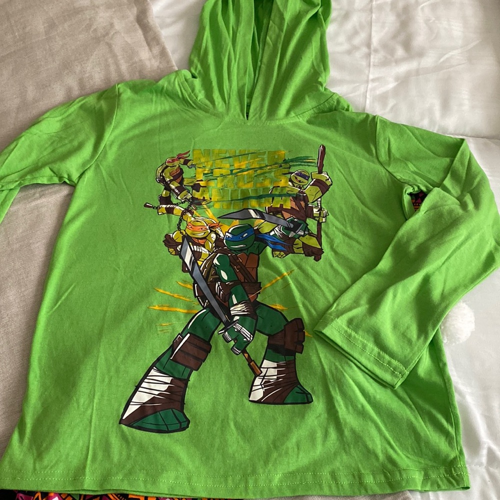 Never cross a Ninja t-shirt in bright green!